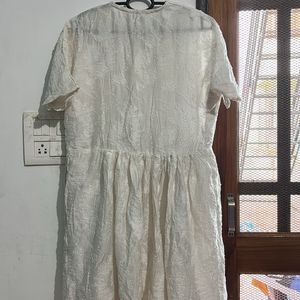 Vintage White Dress with Textured Fabric.