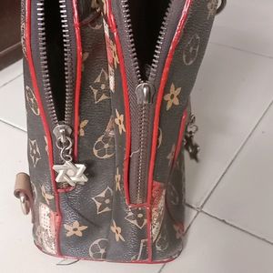 LV Brown Leather Small Backpack cum hand bag...