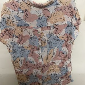 cute top with face print detailing