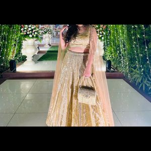 embellish golden lehnga