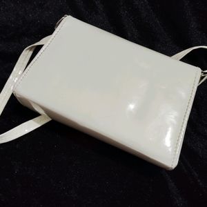 White Slingbag With Golden Chain And Superb Look