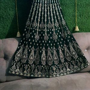 Beautiful hand work bottle green gown