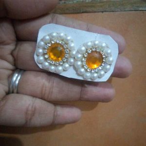 Kundan Studs In Orange Colour