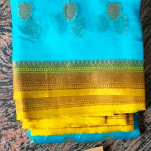 Colours Silver Pattu Saree.