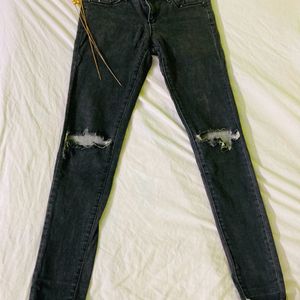 Faded Black Jeans With Knee Ripped