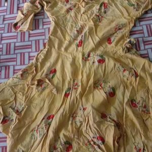 Yellow Cotton Frock With Print Design