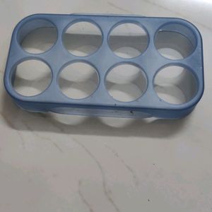 Ice cube maker and egg setter