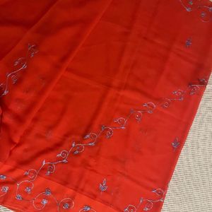 Orange Saree With Blue Shiny Embroidery