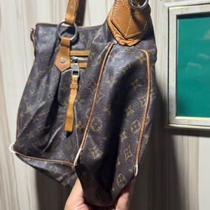 Louis Vuitton Evora Monogram Shoulder Bag