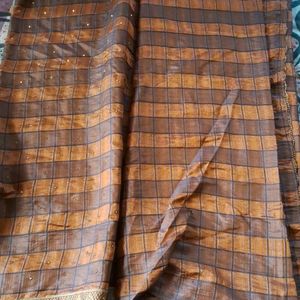 Attractive Checkered Brown Lace Border Saree