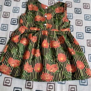 BLACK STRIPS WITH FLOWER CHARM FROCK