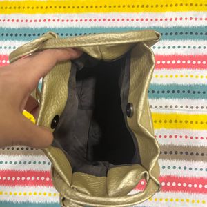 Golden Big Potli Shaped Bag