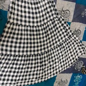 Women Black And white Checked Skirt From Myntra