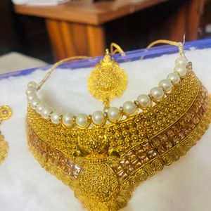 Golden Rajasthani Haar With Long Earrings And Tika