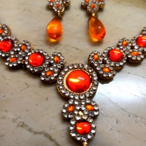 Elegant White And Orange Stone Studded Jewelry Set