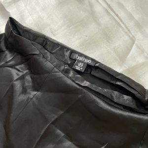 Black satin mini skirt