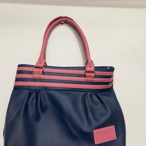 Blue sling purse