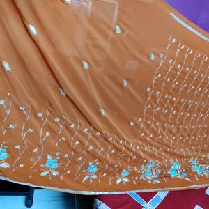 Beautiful Design Light Rust Color Saree