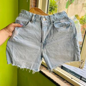 H&M light blue washed ripped shorts