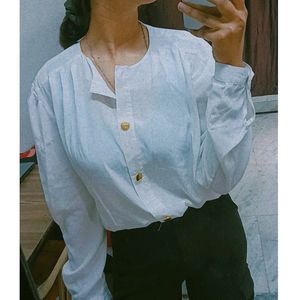 A Perfect Women's White Shirt For This Summer