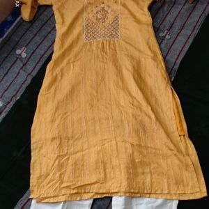 Beautiful Yellow Hand Work Kurta Set.