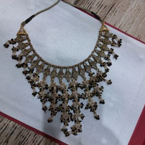 Golden And Black Necklace