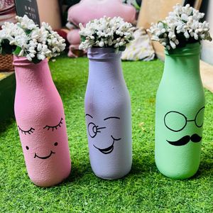 3 Glass Bottles In pastel colours