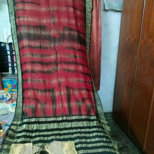 Red Black Saree With Golden Blouse.