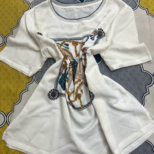 trendy horse print top