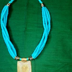 Blue Necklace With Gold Brass Pendant