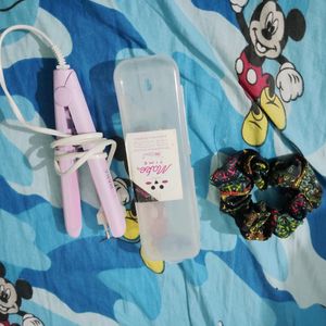 Unused Hair Scrunchie And A Mini Hairstraightner