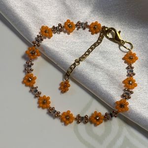 crystals and orange colour bracelet