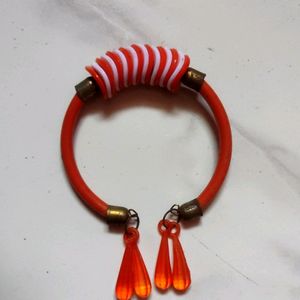 2 Piece Of Purple And Orange Coloured Bracelet