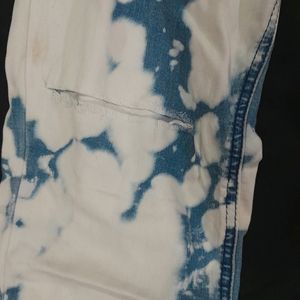 Ripped Cow Print Jeans