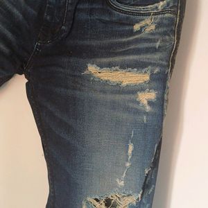 Ripped Faded Jeans Brand New