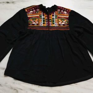 A Black Top With Good Or Excellent Quality