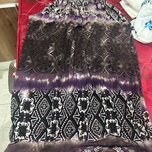 Selling A Purple & Black Dress.