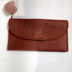 simple peach-colour hand purse