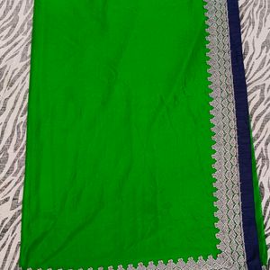 green colour white border saree