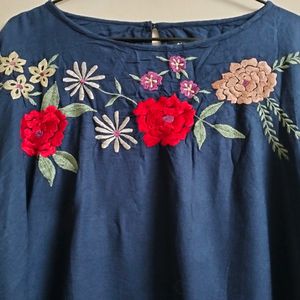 Blue Top With Embroidery On Neck