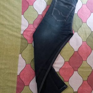 It Is A Jeans Pant Of Black Colour Branded