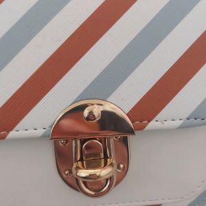 White And Blue Striped Slingbag