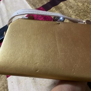 Golden Handwork Clutch