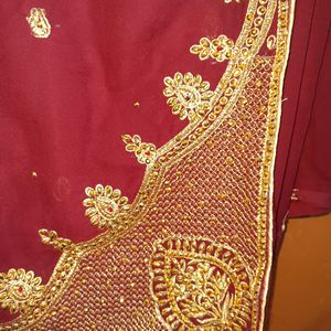 Beautiful maroon heavy bridal saree