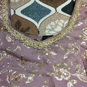 A beautifully embellished Garara Set