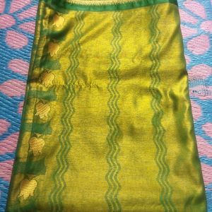 Green Saree With Golden Flowers Design