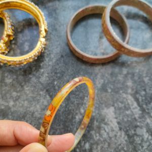 Gold Bangles Pair, And Plastic Bangle