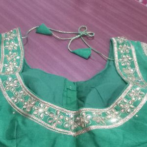 Beautiful  gree. colou raw silk blouse  38 size upto 42 alterable with front open