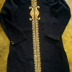 Sherwani with hard shoulder and embroidery.