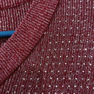 Knit Fabric With Metallic Threads Woven In.